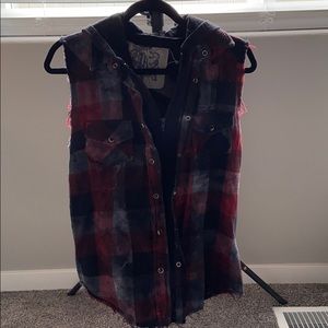 Plaid vest.